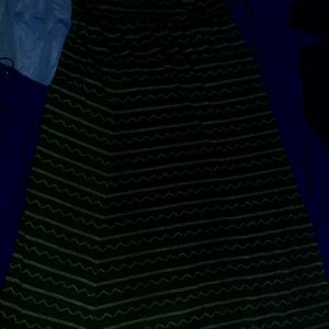 Two long skirts black white green black